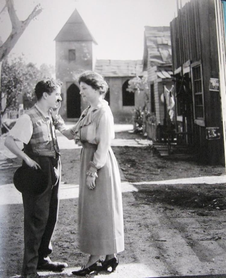 Charlie Chaplin meets Hellen Keller.
