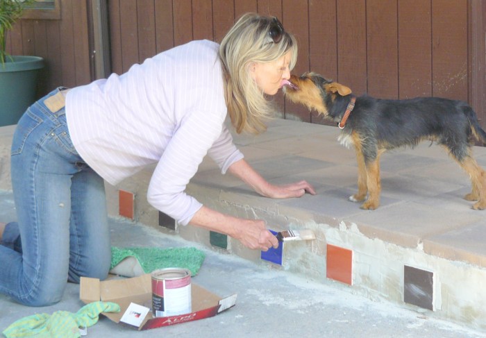 Sweeny loving Jeannie on the door-step of our Payson house; May, 2011.